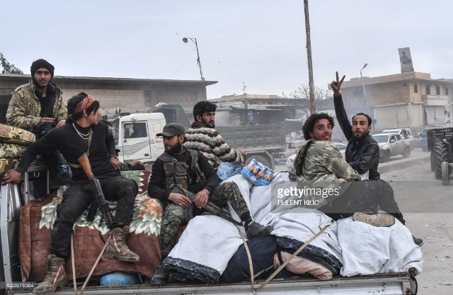 afrin kent merkezi cihatcilar yagma 18mart2018 afp 16